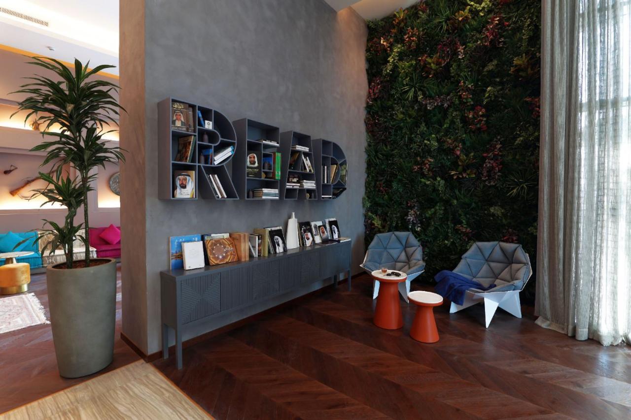 Pullman Sharjah Hotel Bagian luar foto Living wall in a private home