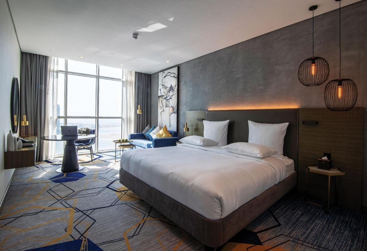 Pullman Sharjah Hotel Bagian luar foto Deluxe Room