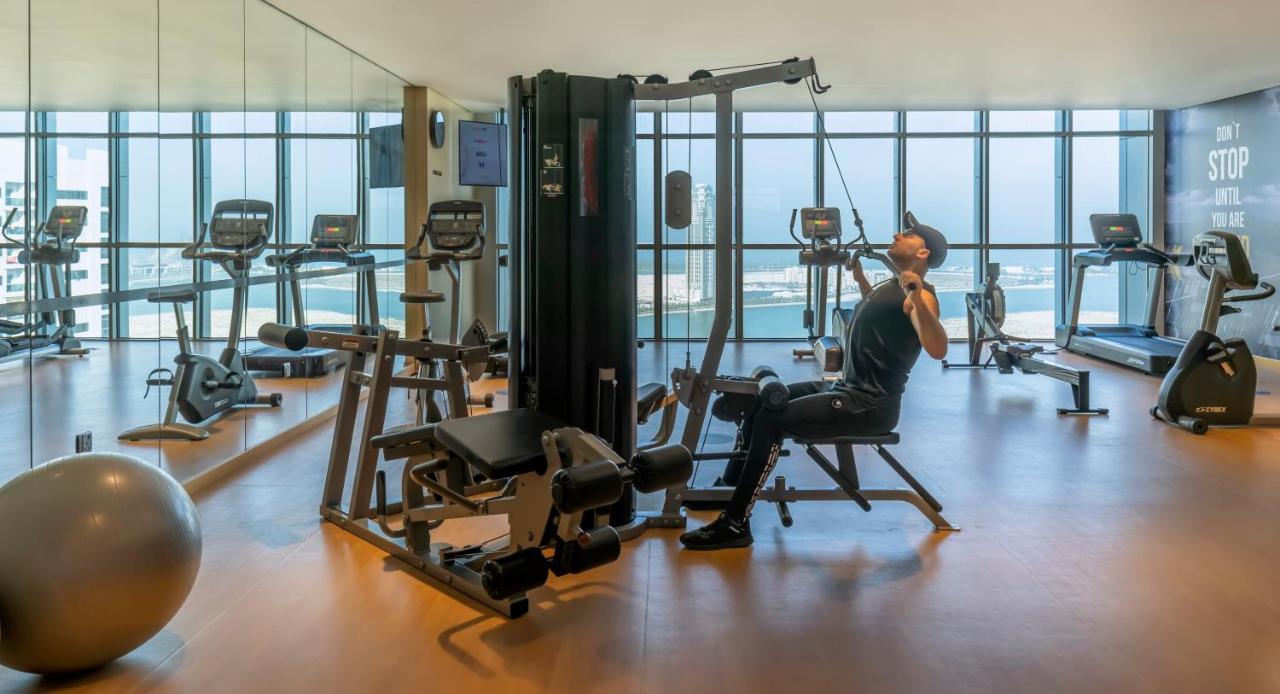 Pullman Sharjah Hotel Bagian luar foto The gym at the hotel