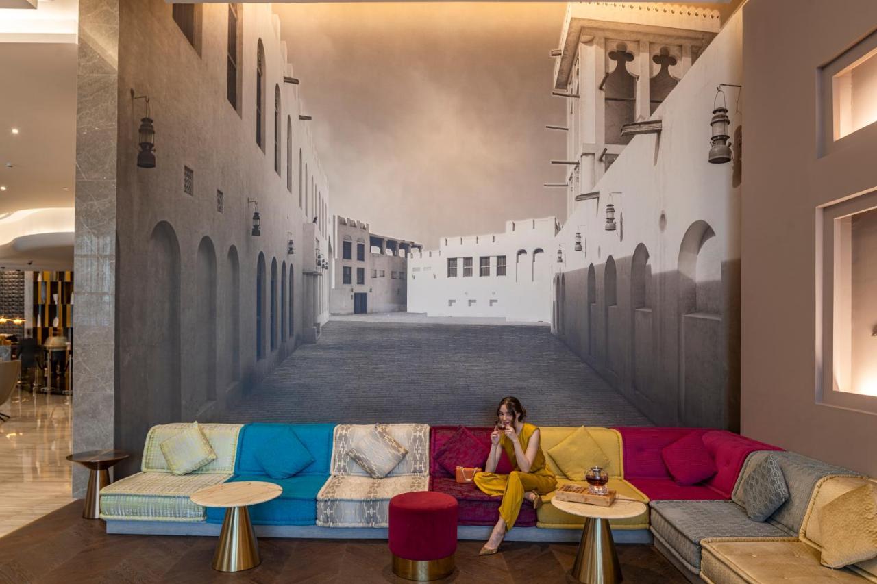 Pullman Sharjah Hotel Bagian luar foto The lobby of the hotel