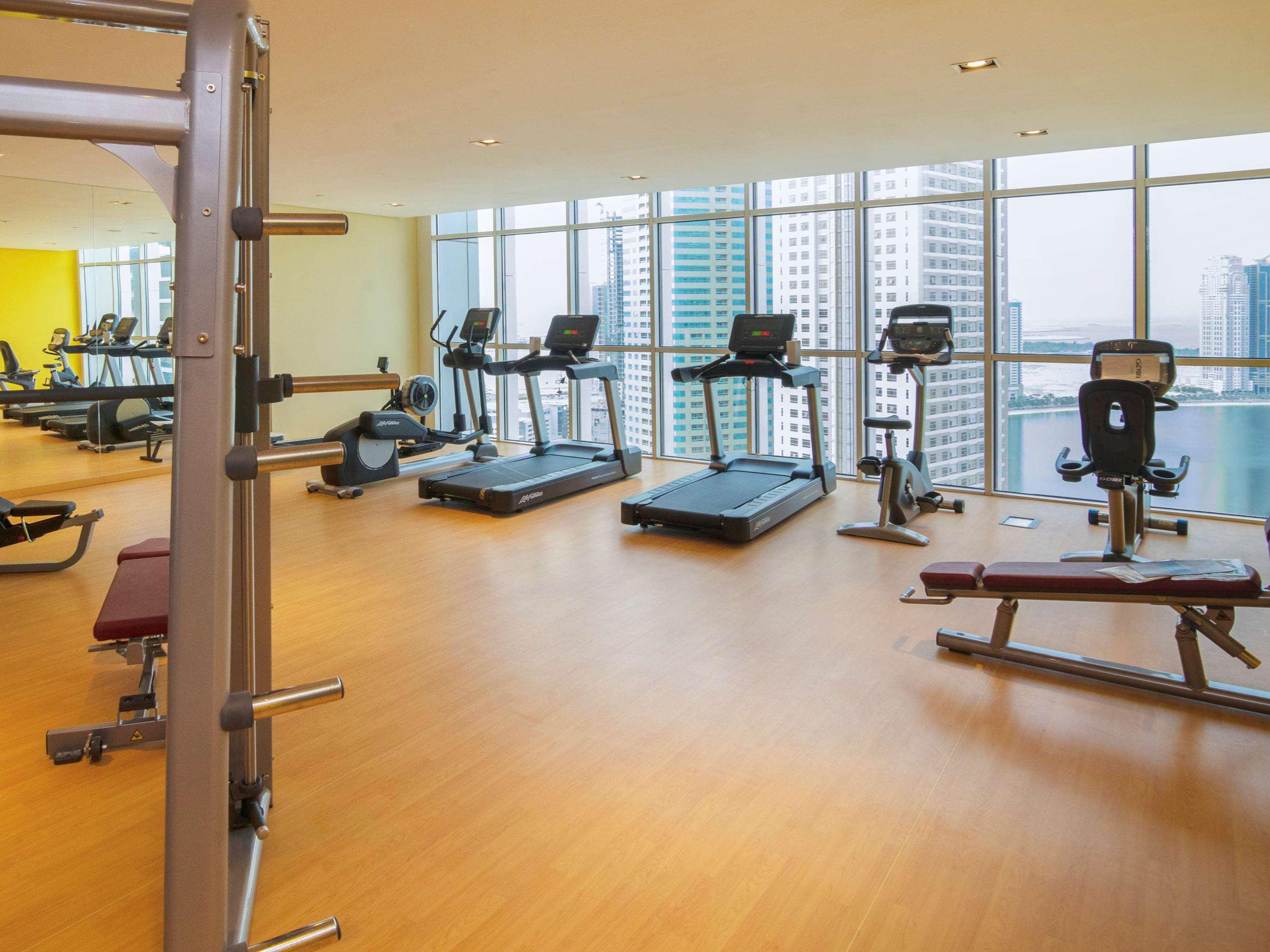 Pullman Sharjah Hotel Bagian luar foto A gym at a hotel in Dubai
